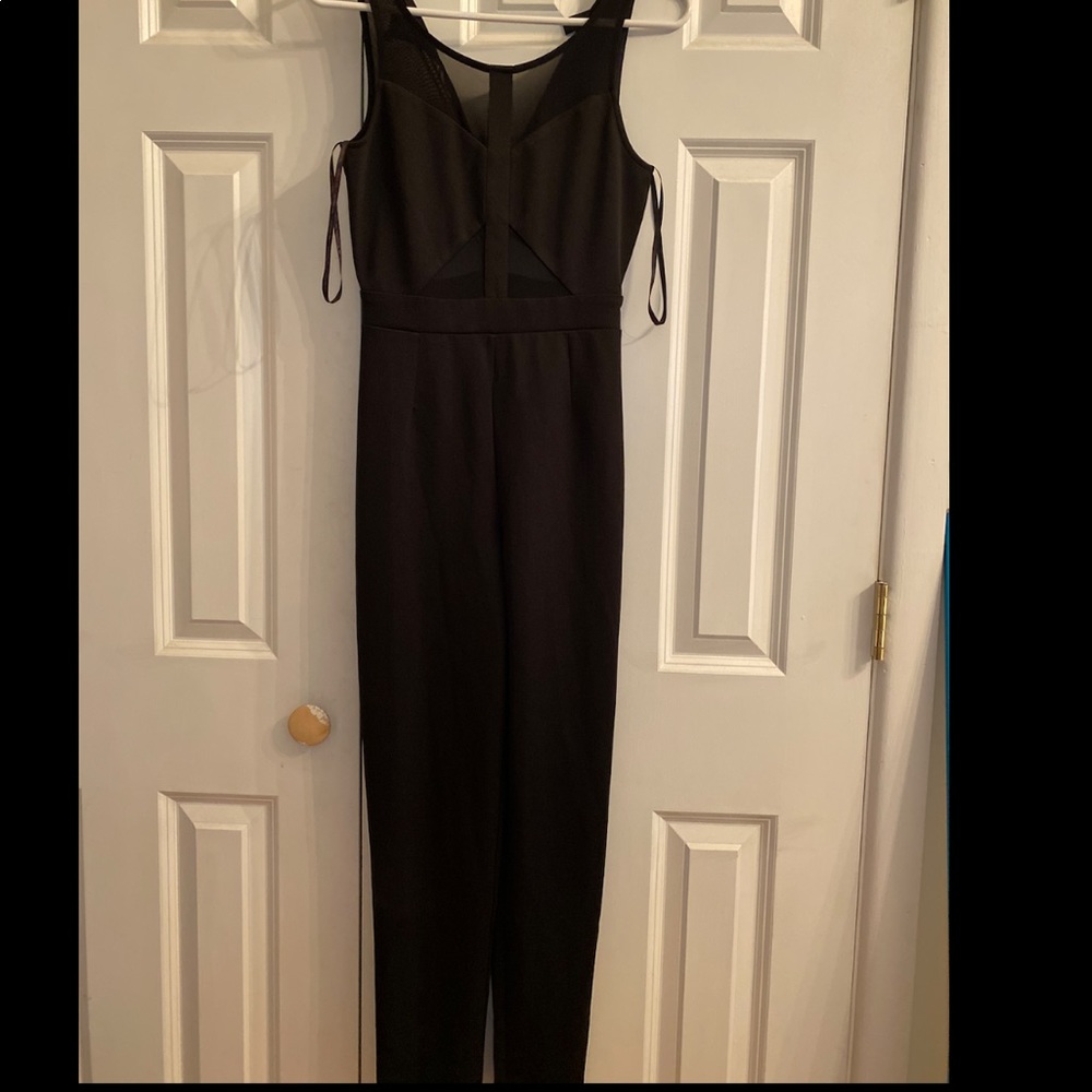Black pant romper with mesh cut outs